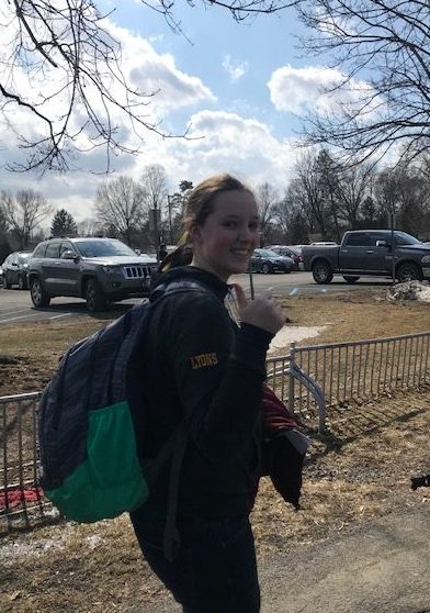 Reporter Emily Lyons stays optimistic about our fragile school spirit as she marches out of RHS to participate in the Walk Out to address climate change.