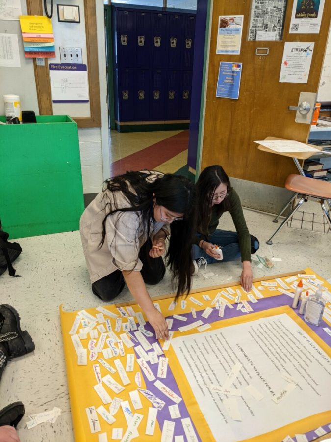 Students Vanessa Lucas-Pablo and Adrielle Whidbee compile student signatures for our schools No Place for Hate pledge the week following the presentations in ELA.