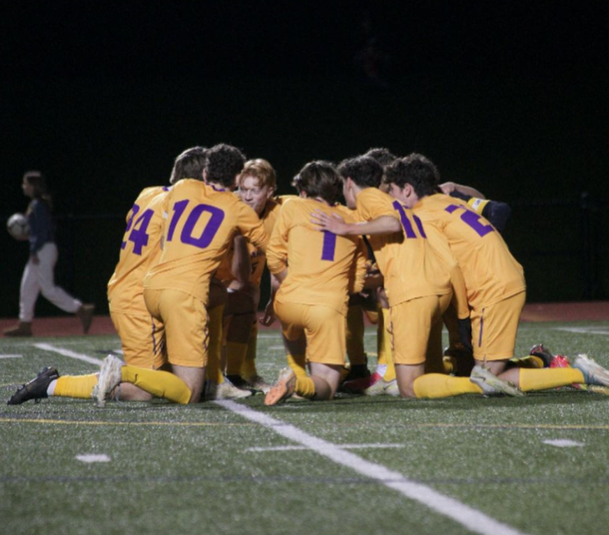 Boys+varsity+soccer+huddles+up+before+their+game+vs+Our+Lady+Of+Lourdes.