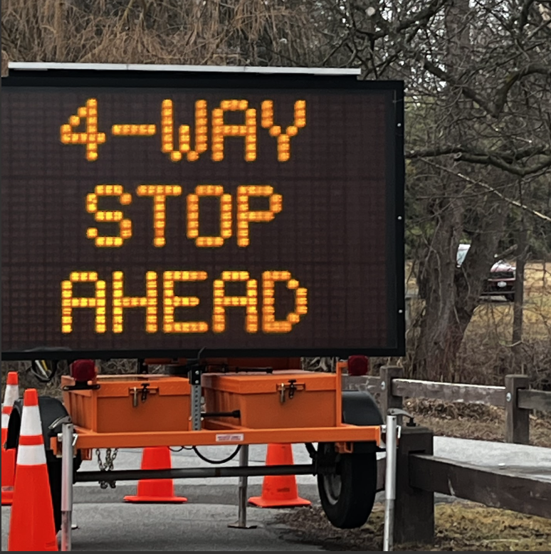 Students are given protection with new four-way stop.