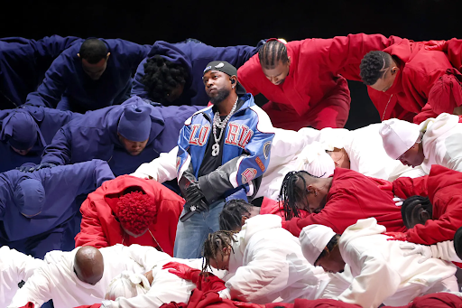 A snippet from Kendrick Lamar’s Super Bowl performance shows dancers lined up as an American flag.