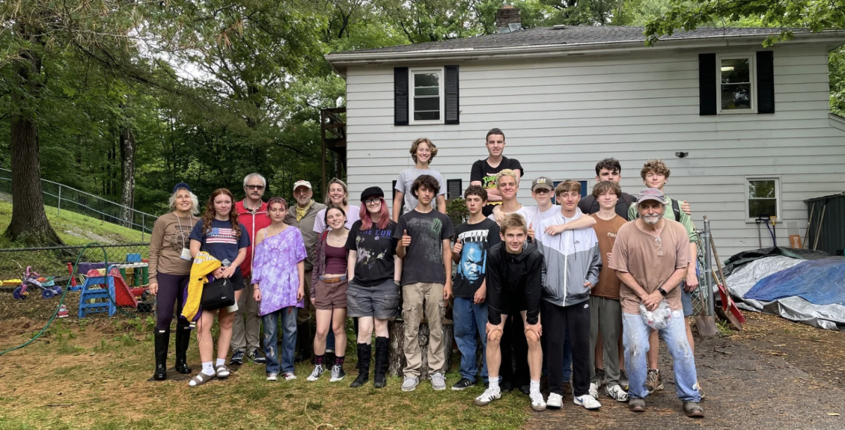 These RHS students and members of the rotary spent the 2025 Day of Service at Northern Dutchess Daycare mulching the play yard, washing outdoor toys, painting, weeding the garden, putting together furniture and a compost bin, and putting up curtains