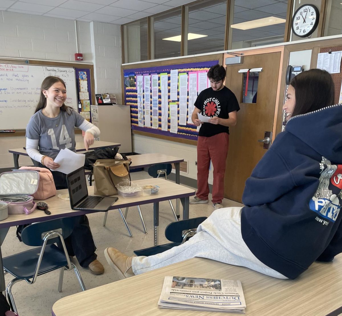 Behind the scenes broadcasters prepare to film the morning news.